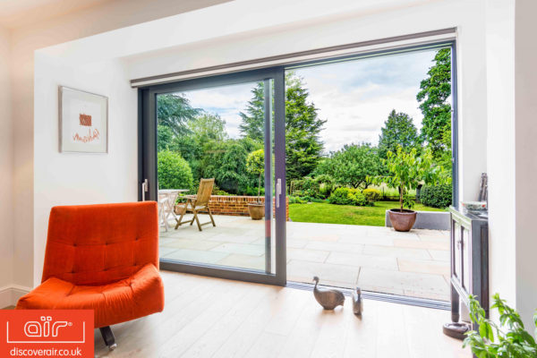 air-lift-and-slide-aluminium-doors-open-out-into-beautiful-garden
