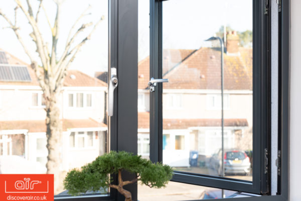 Light-airy-open-MOD-Flush-aluminium-windows-in-dark-grey