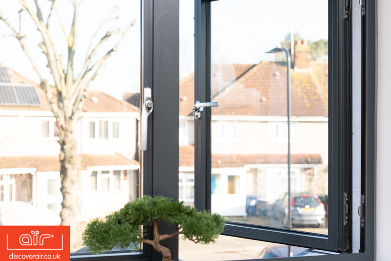 Light-airy-open-MOD-Flush-aluminium-windows-in-dark-grey