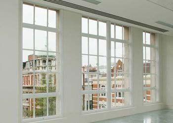 Vertical sliding secondary glazing shaws