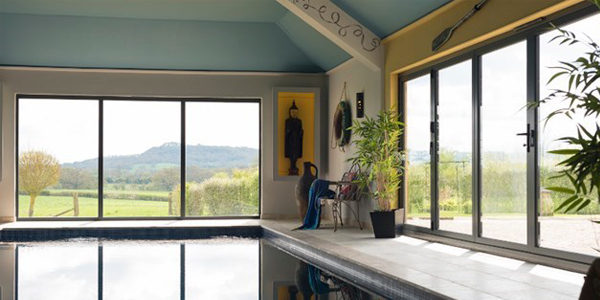 Swimming pool with bi fold door system Swimming pool with bi fold door system