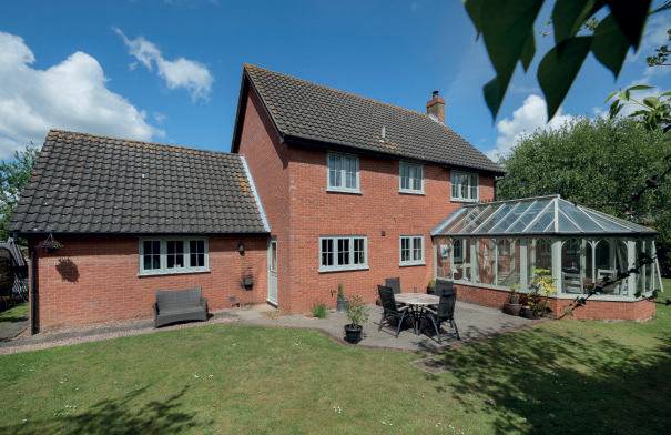 Large home with conservatory with residence 7 doors title=