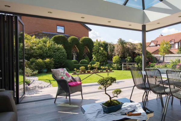 Large conservatory view of summer garden ob 49 origin door open Origin