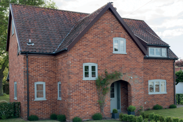 Statley home with residence r9 doors windows green